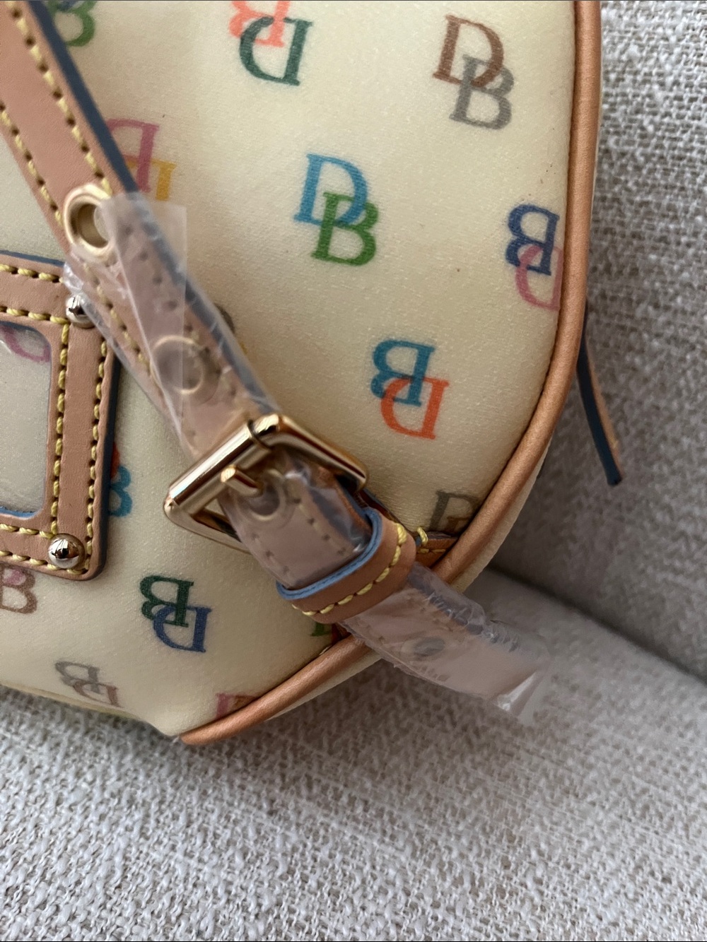 NWT Dooney & Bourke Cream Multicolor Logo Coated Canvas Backpack with Tan Trim - Picture 4 of 14
